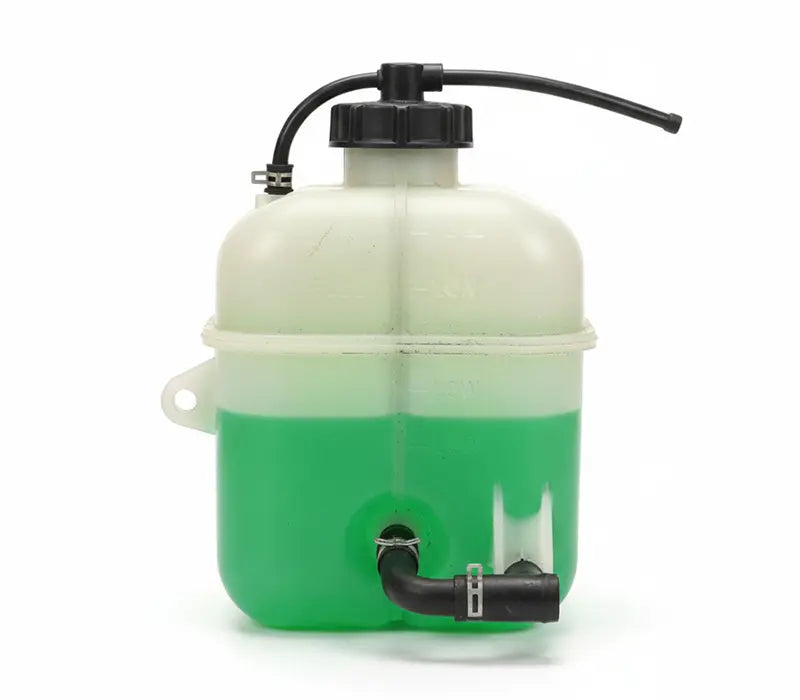 Vase d expansion transparent rempli de liquide de refroidissement vert