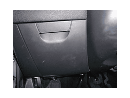 Boîte à fusibles située sous le volant d'une Fiat Stilo pour branchement diagnostic