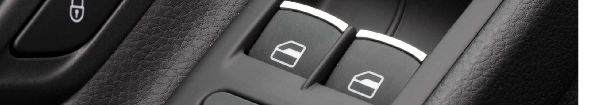 Gros plan sur les boutons de commande de lève-vitre électrique d une portière de voiture