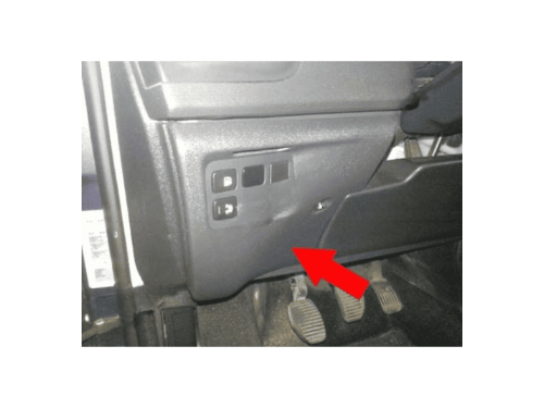 Boutons de reglage de la hauteur des phares dans une Citroen C4 Picasso